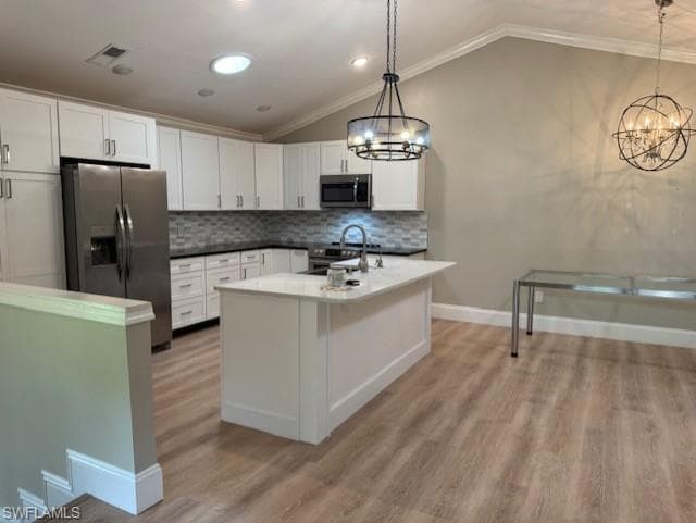 Kitchen Showing dining area and Designer lighting