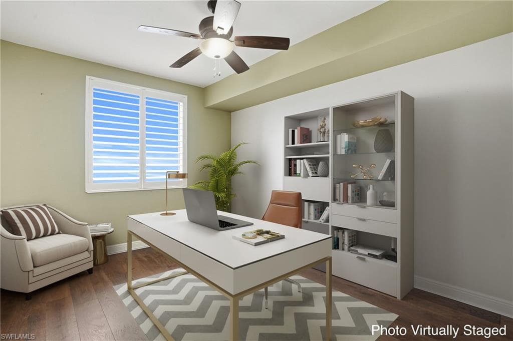 Virtually Staged 3rd bedroom as office featuring hardwood flooring and ceiling fan