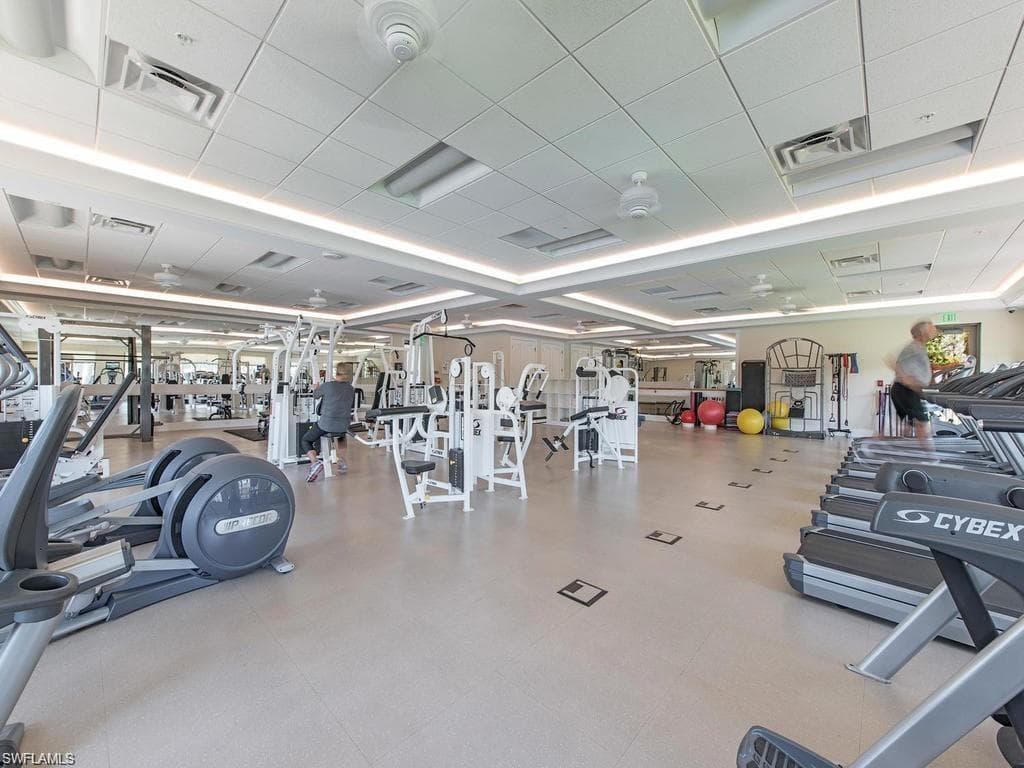 Exercise room with a paneled ceiling