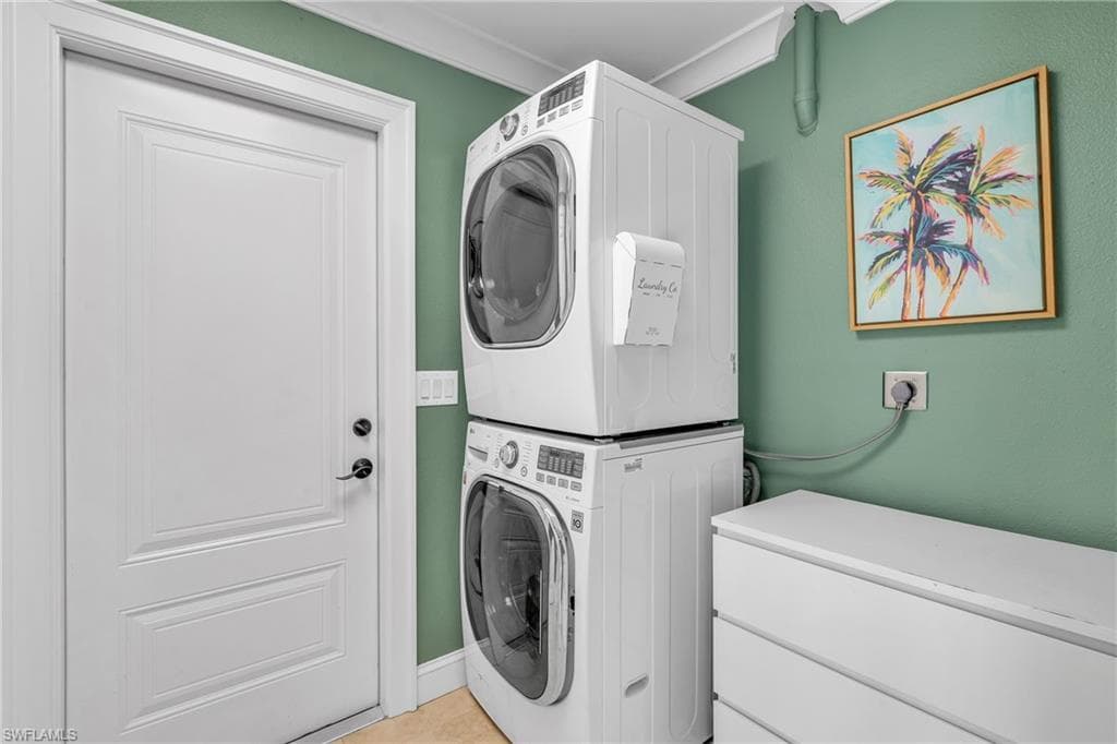 Laundry room with stacked washer / dryer
