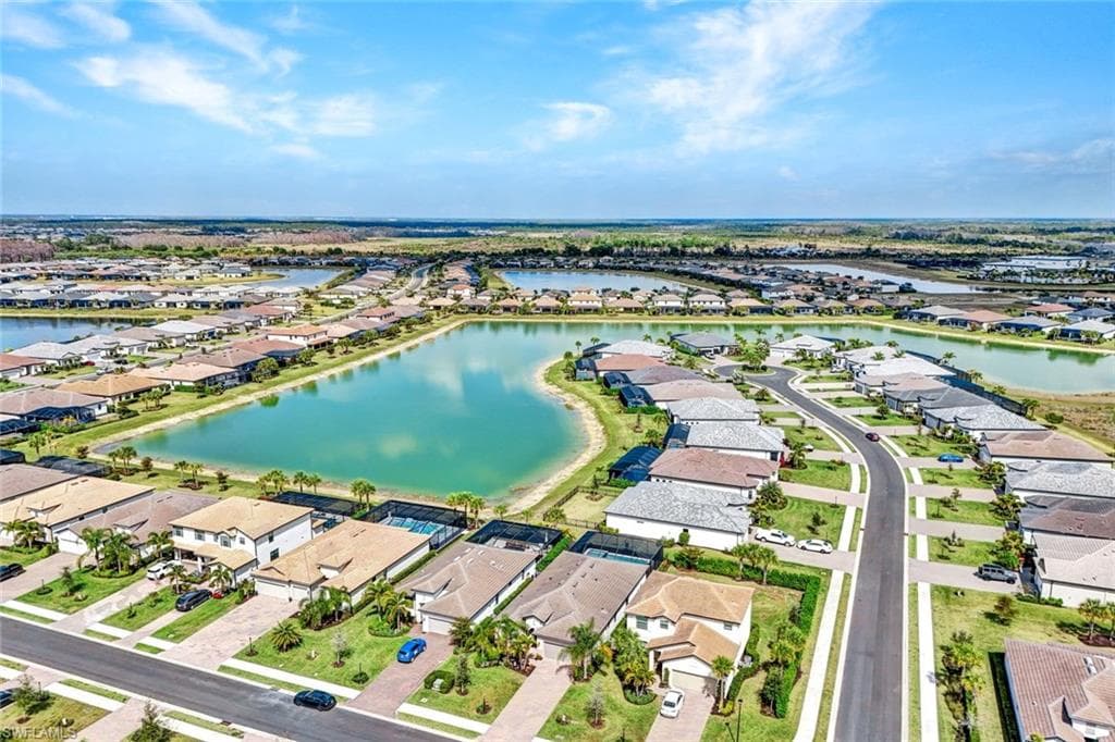 Aerial view of residential area with a large body of water
