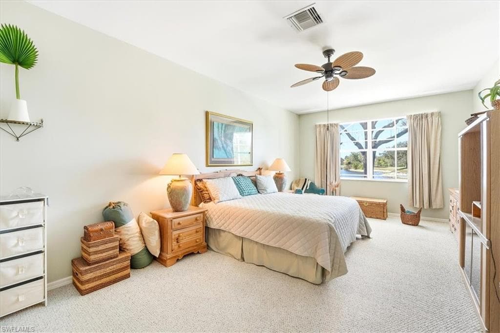 Bedroom featuring carpet floors and a ceiling fan