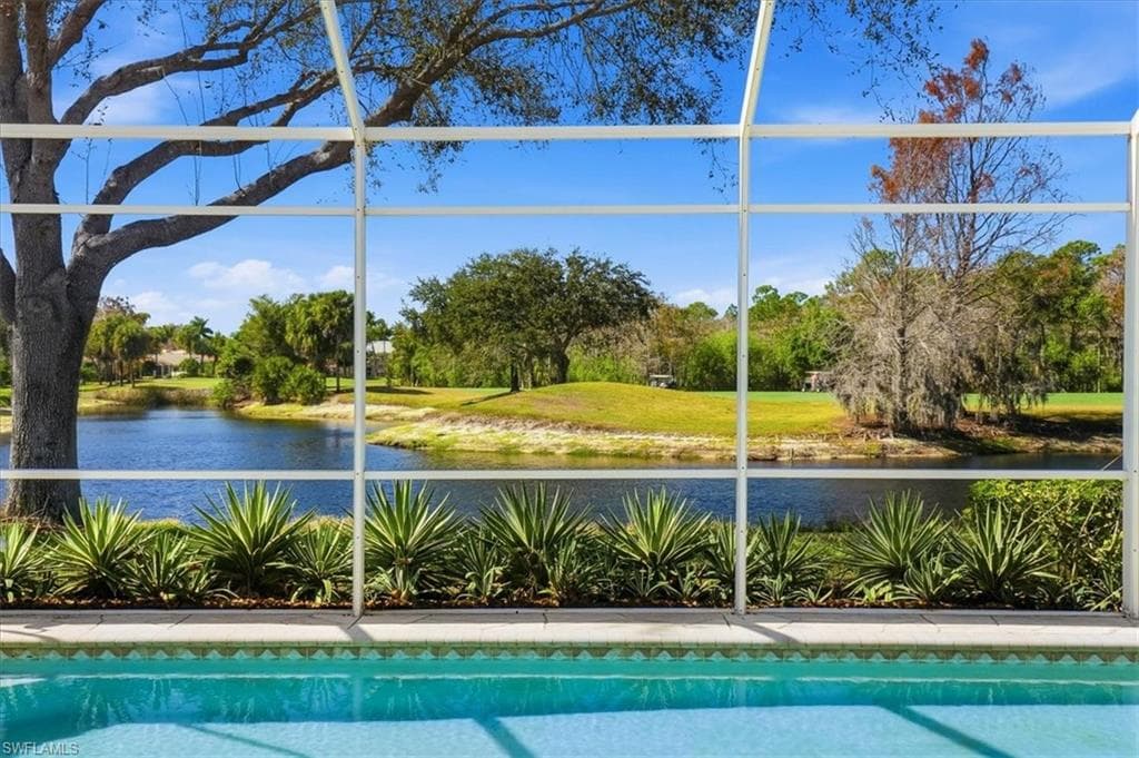 Outdoor pool featuring a water view
