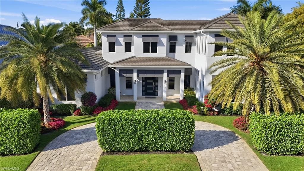Beautiful private curb appeal with circular drive
