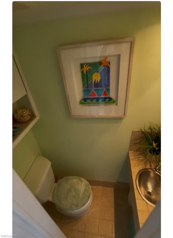 Bathroom featuring vanity and tile patterned floors