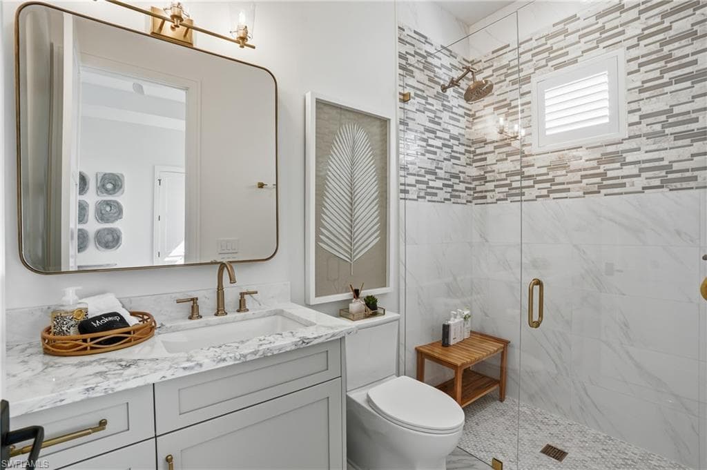 Full bathroom featuring vanity and a stall shower - Virtually Edited Image