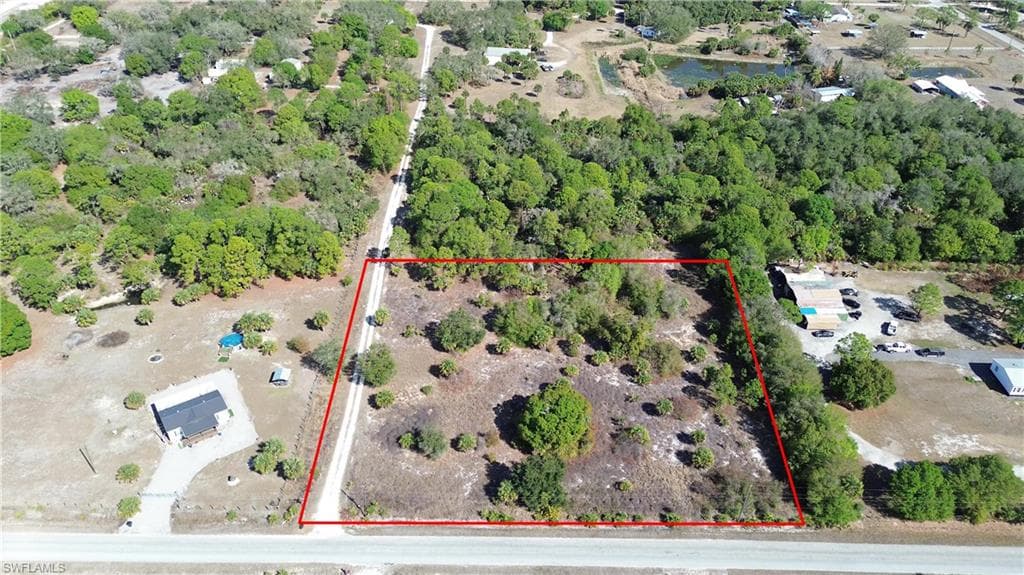 Aerial view of property's location with property parcel outlined