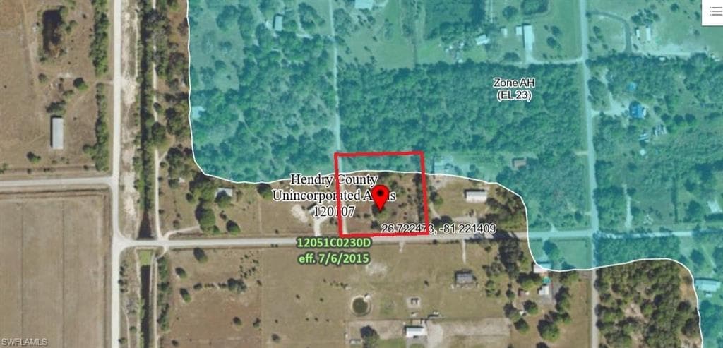 Aerial overview of property's location featuring property parcel outlined
