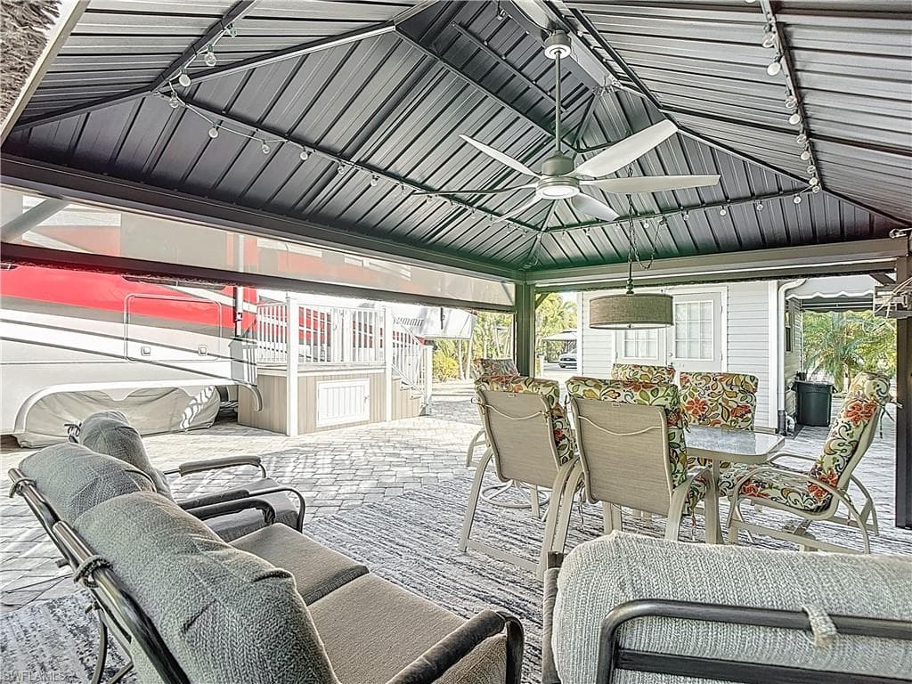 View of patio with ceiling fan