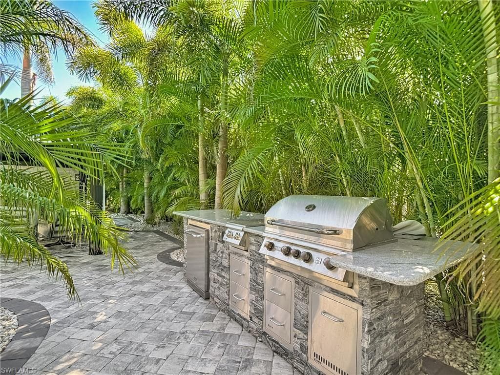 View of patio / terrace featuring an outdoor kitchen