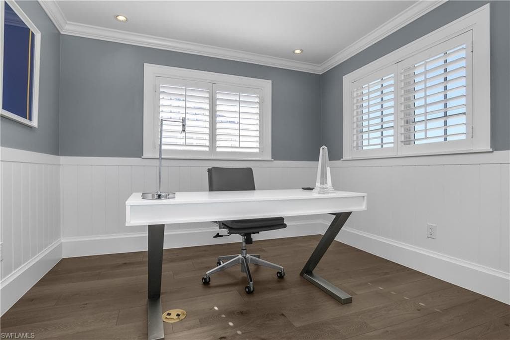 Office area with dark wood-type flooring, a wainscoted wall, recessed lighting, and ornamental molding