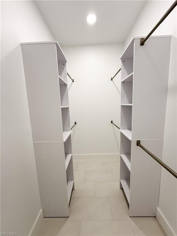 View of walk in closeting Master Bedroom