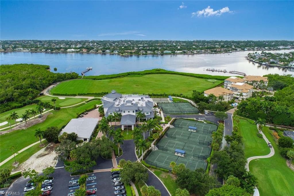 Located in the prestigious Windstar on Naples Bay community featuring a private marina, beach club on Keewaydin Island, and resort style amenities.