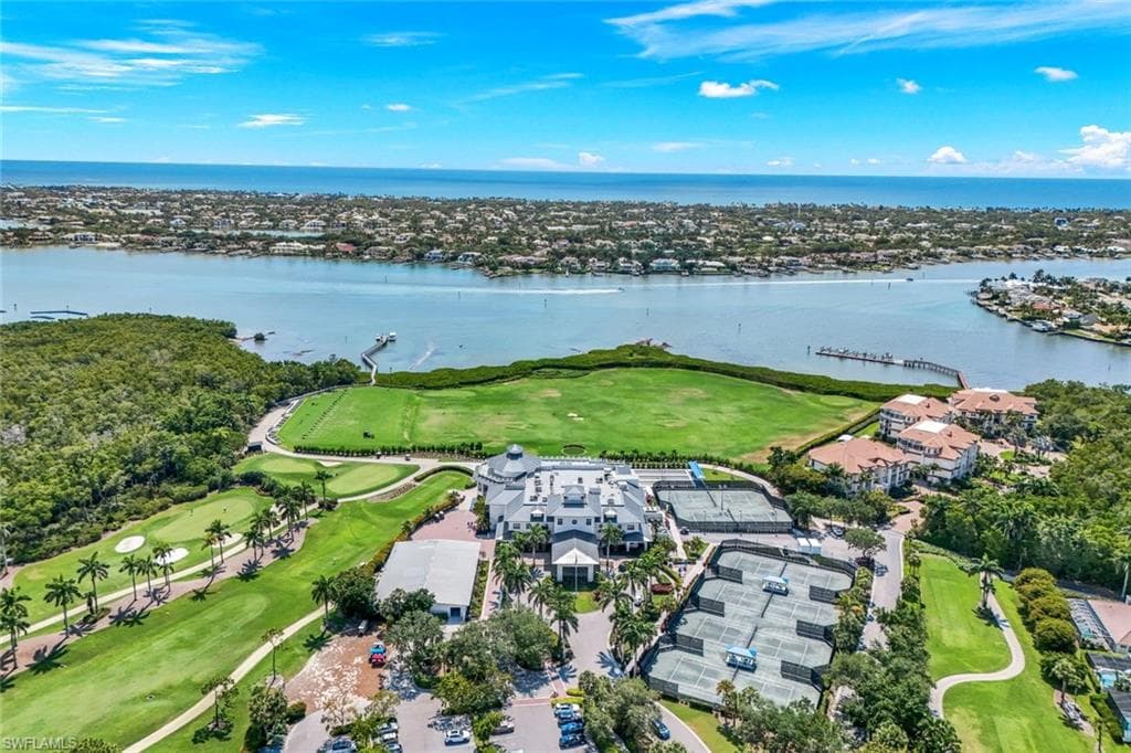 Located in the prestigious Windstar on Naples Bay community featuring a private marina, beach club on Keewaydin Island, and resort style amenities.