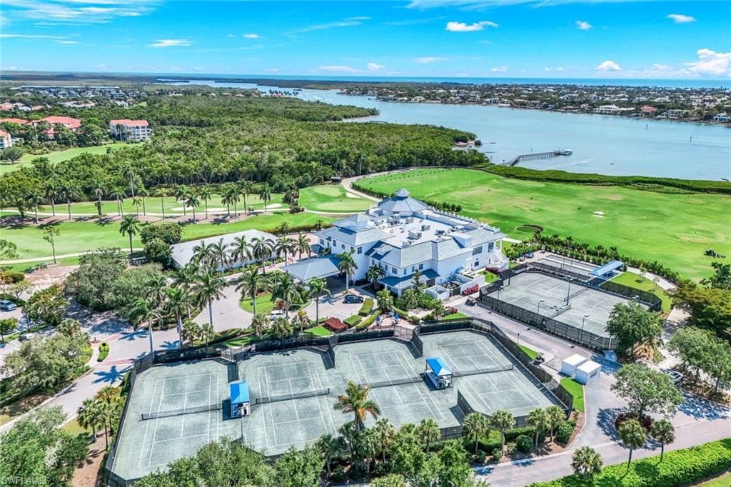 Located in the prestigious Windstar on Naples Bay community featuring a private marina, beach club on Keewaydin Island, and resort style amenities.