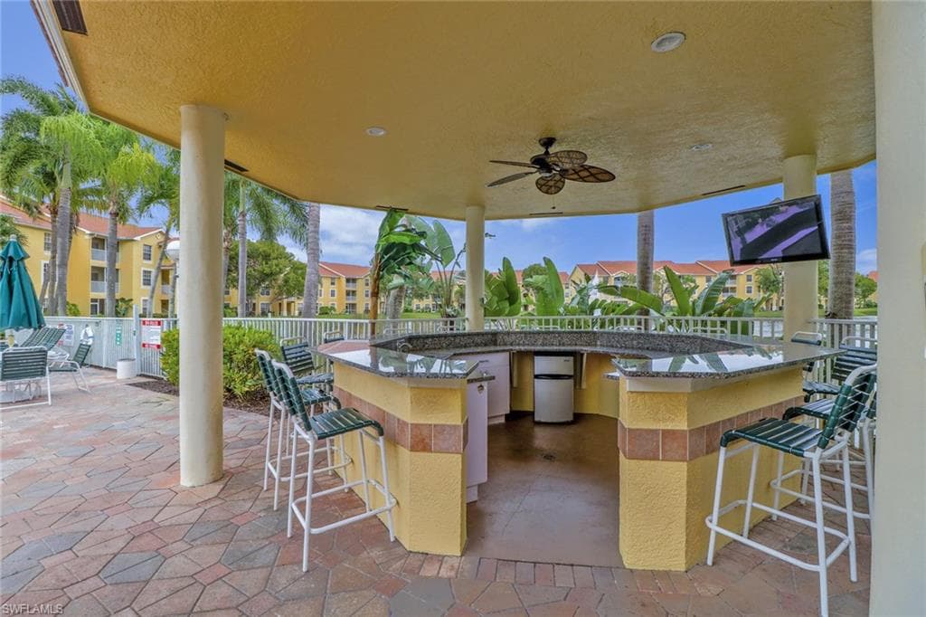 View of patio / terrace with a ceiling fan