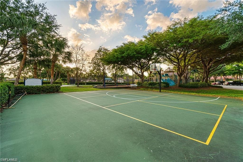 View of basketball court featuring community basketball court