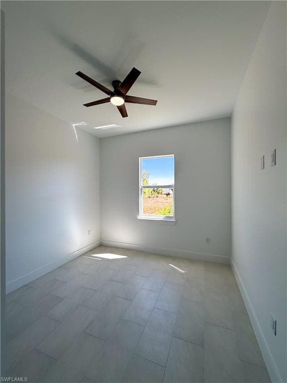 Bedroom with baseboards and ceiling fan