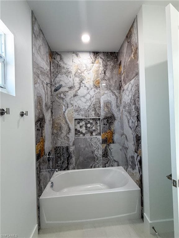 Full bathroom with shower / bath combination and recessed lighting