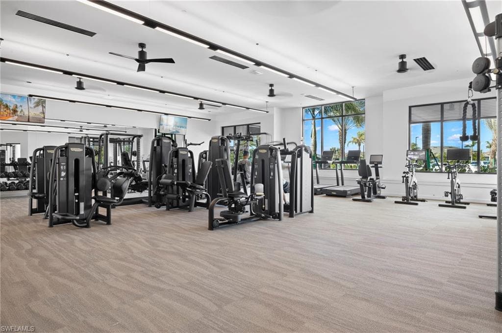 Workout area featuring ceiling fan