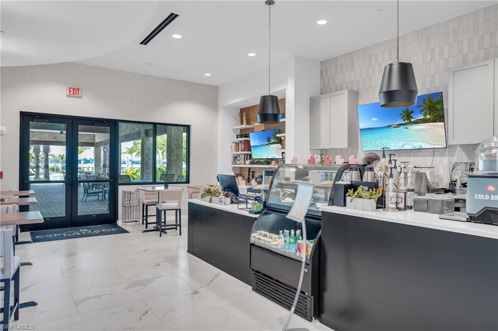 Reception area featuring french doors and recessed lighting