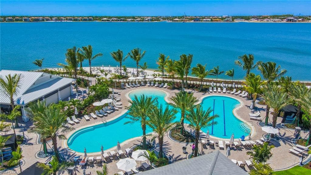Community pool with a water view