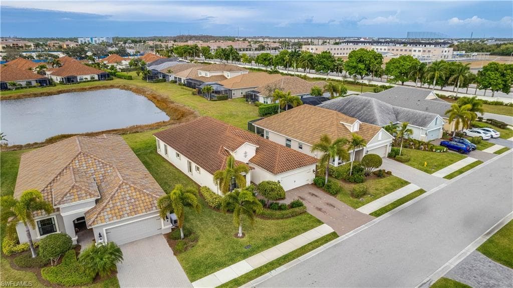 Aerial view of residential area with a large body of water