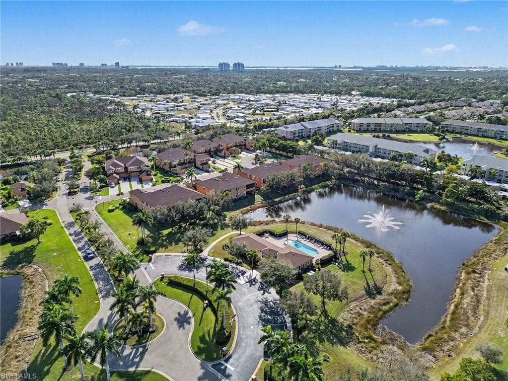 Aerial view of community showing body of water