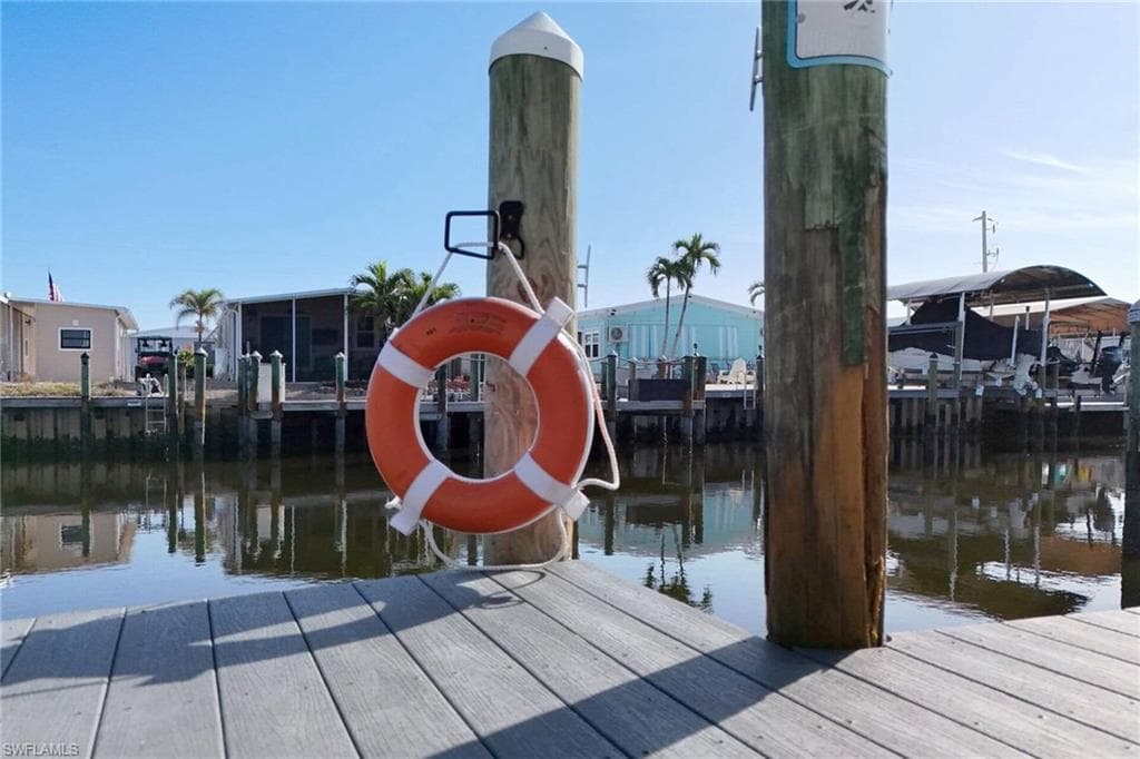Dock featuring a water view
