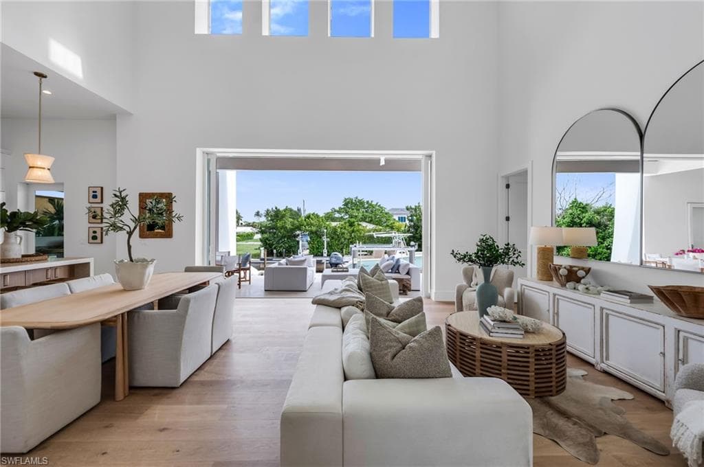 Living Room - View 1- Open to Dining, Kitchen, & Outdoor Entertaining Area