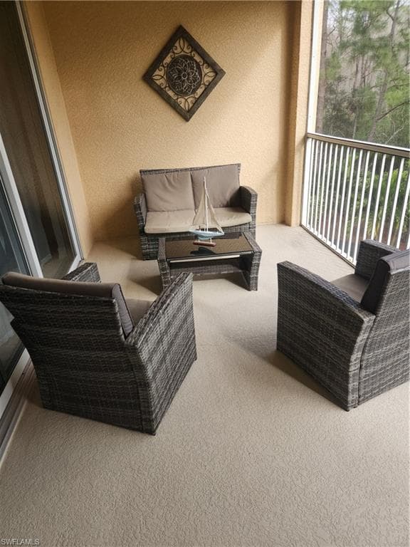 Balcony featuring an outdoor hangout area