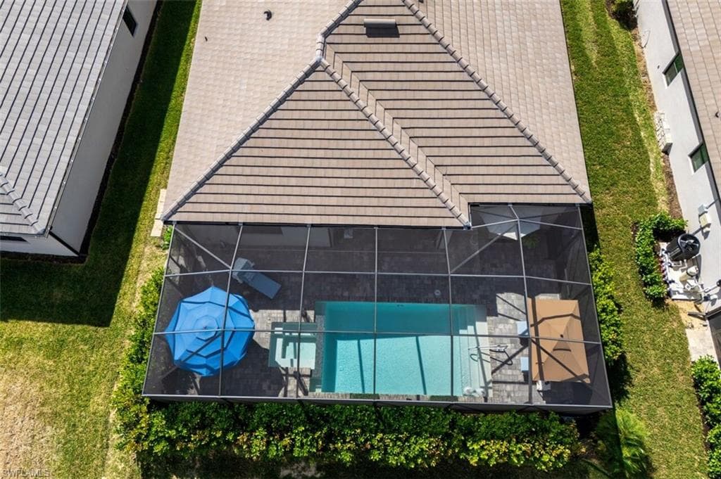 View from above of property featuring a pool