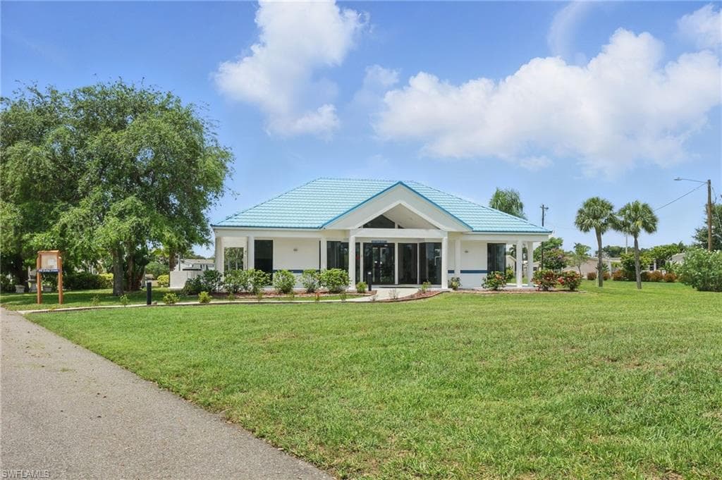 Free Standing Gym Building with tiled roof, and covered porch