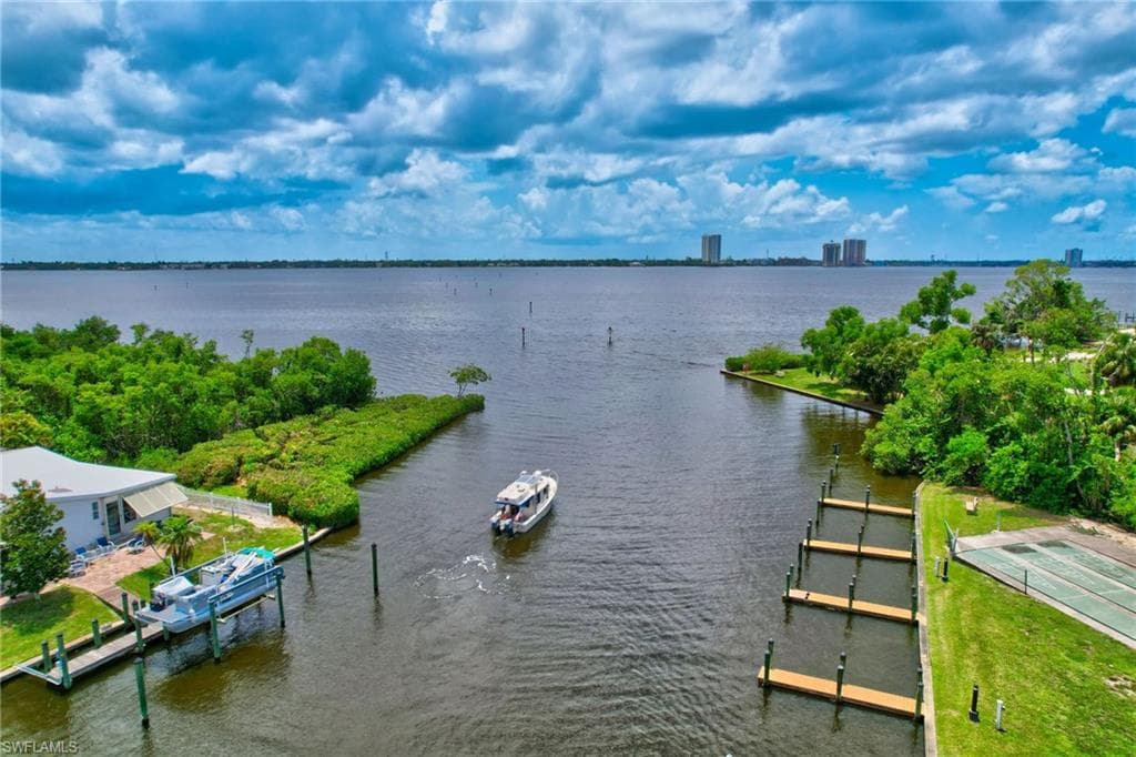 Water view with a dock