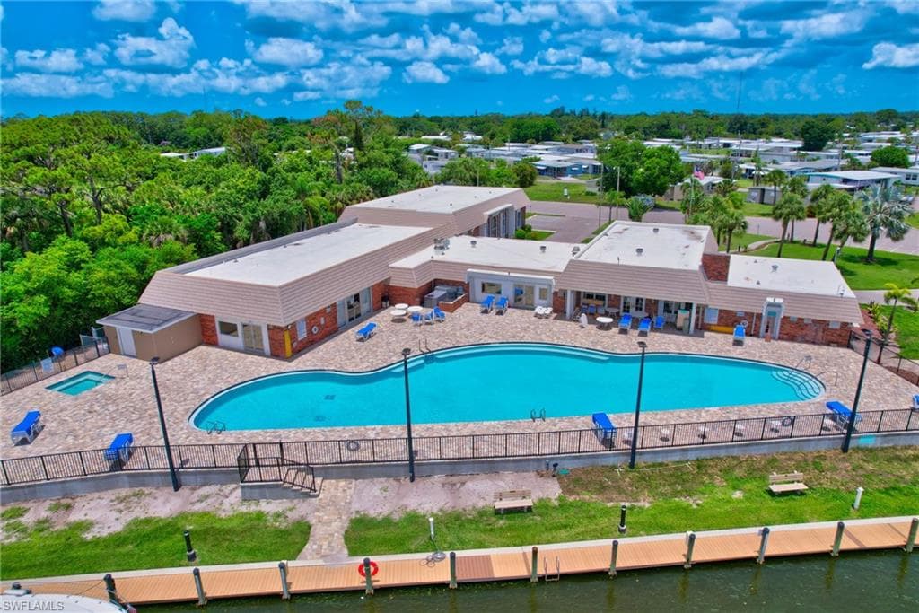 Community pool with a patio area