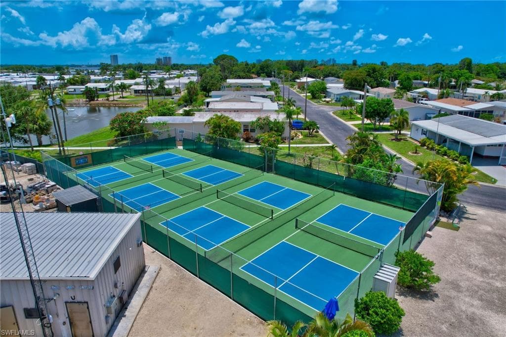 Aerial view of residential area with a nearby body of water