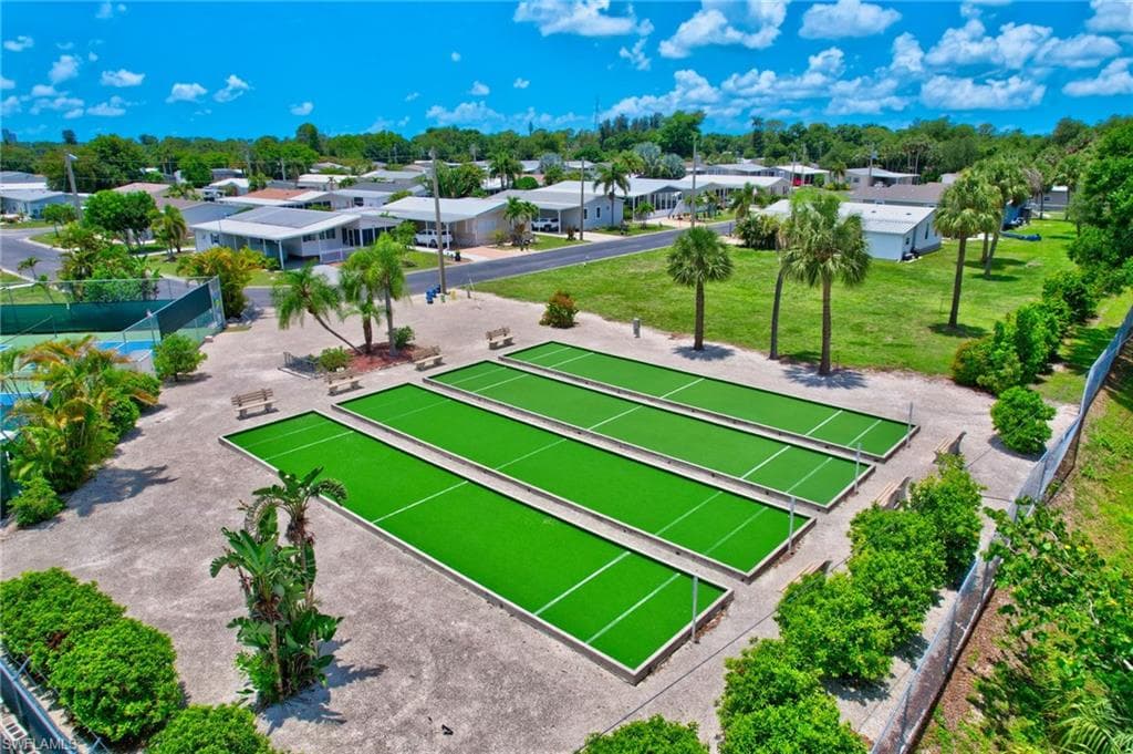 View of home's community featuring a game area and a residential view
