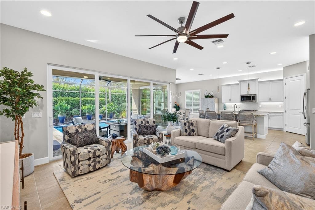 SEE IT??? The zero corner sliding doors wrap around from the great room to the dining room and when opened provide an extra outdoor room for your year round use in paradise!!!
