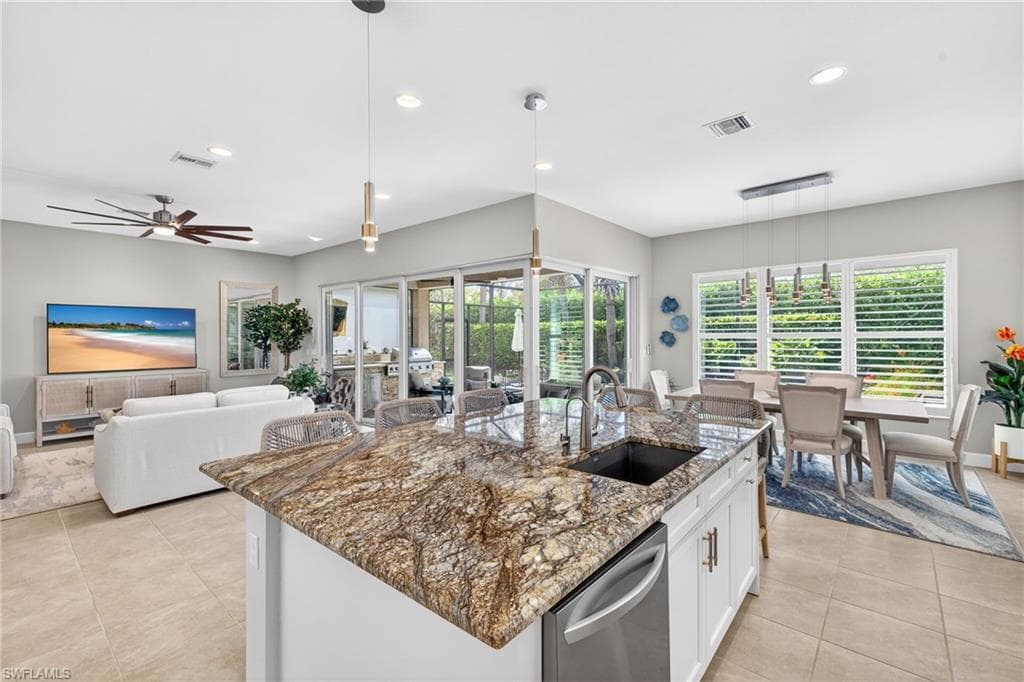 Shot from the pantry corner of the kitchen capturing the amazing living space present in this Sierra model.