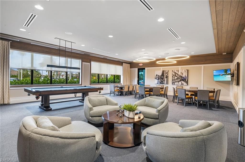Rec room with billiards table and recessed lighting