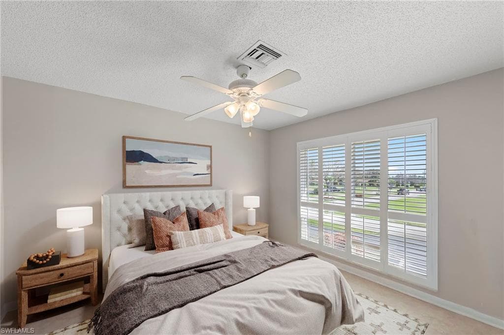 Guest bedroom staged with furniture