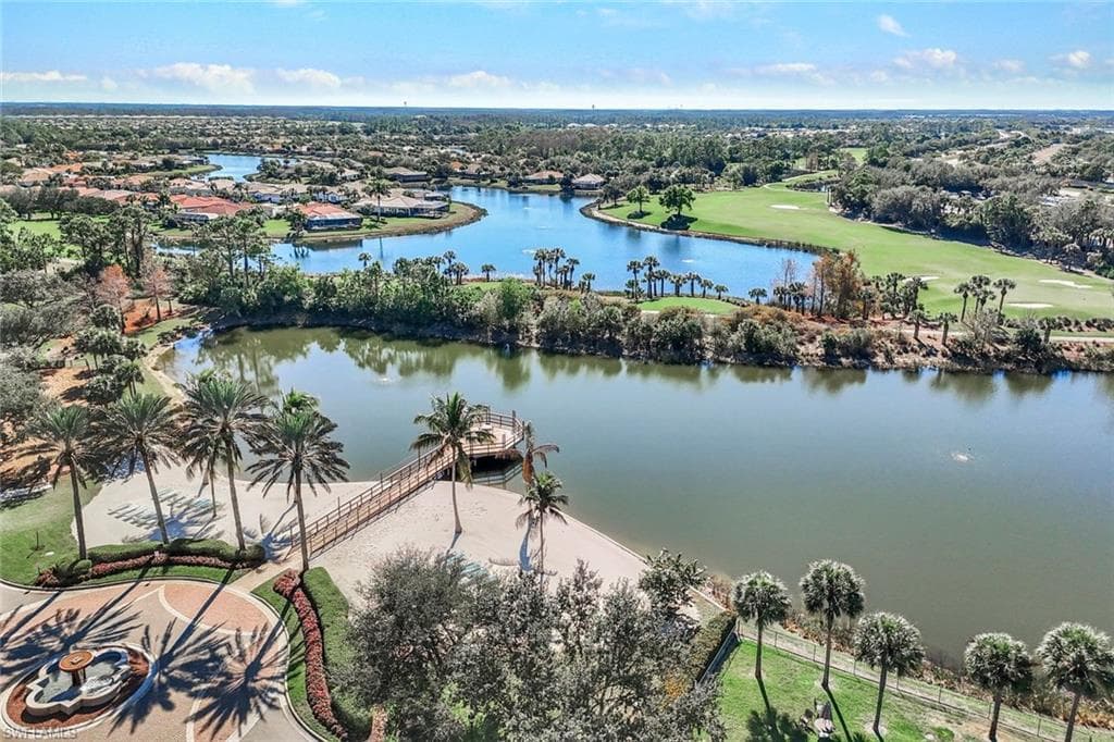Aerial view of a nearby body of water and a local golf course