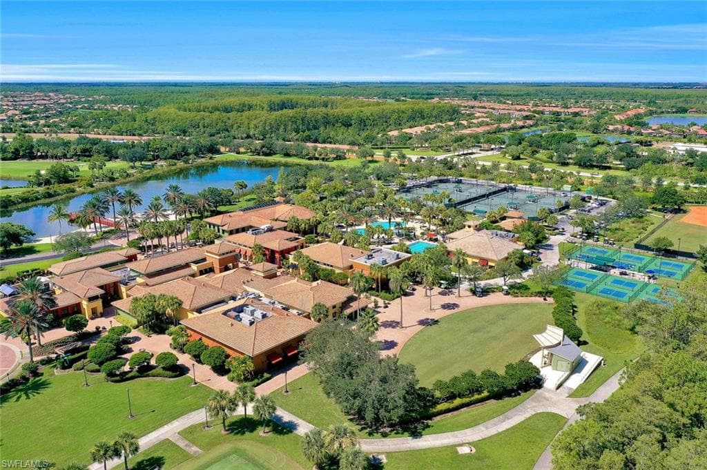 Aerial view of residential area with a large body of water