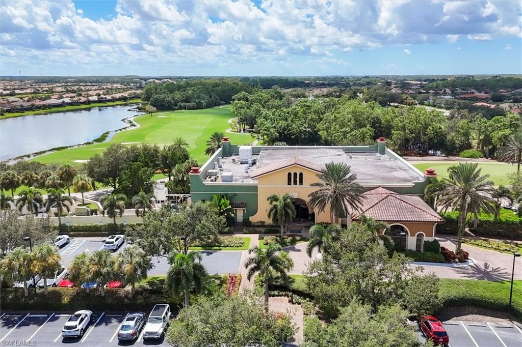 Aerial view of a golf club and a nearby body of water