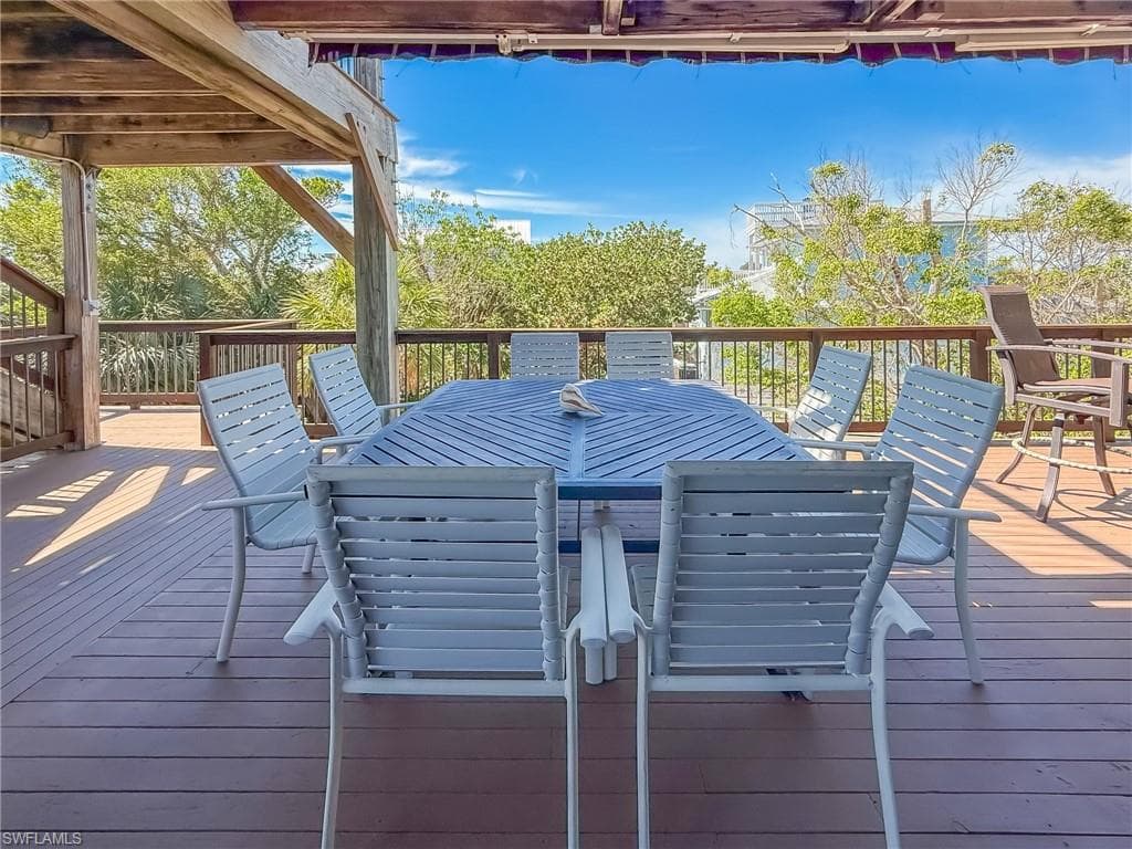 Wooden deck featuring an outdoor hangout area