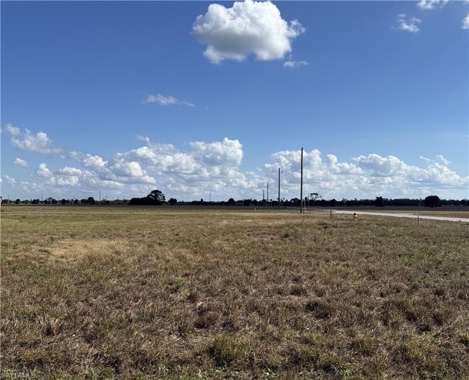 Looking at lot from street