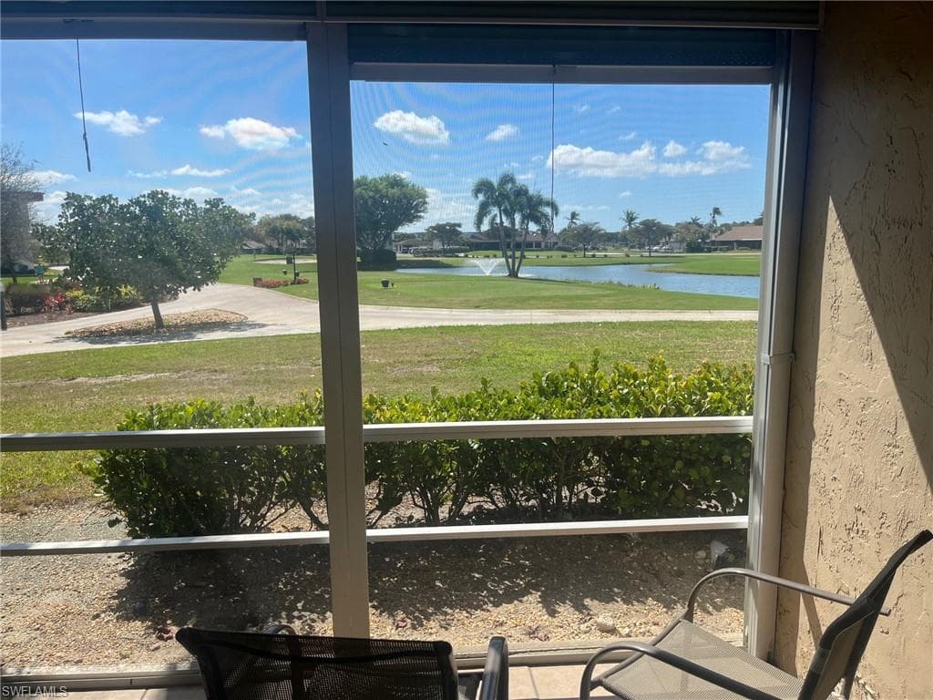 View of Golf Course and Lake from Screened-In Lanai