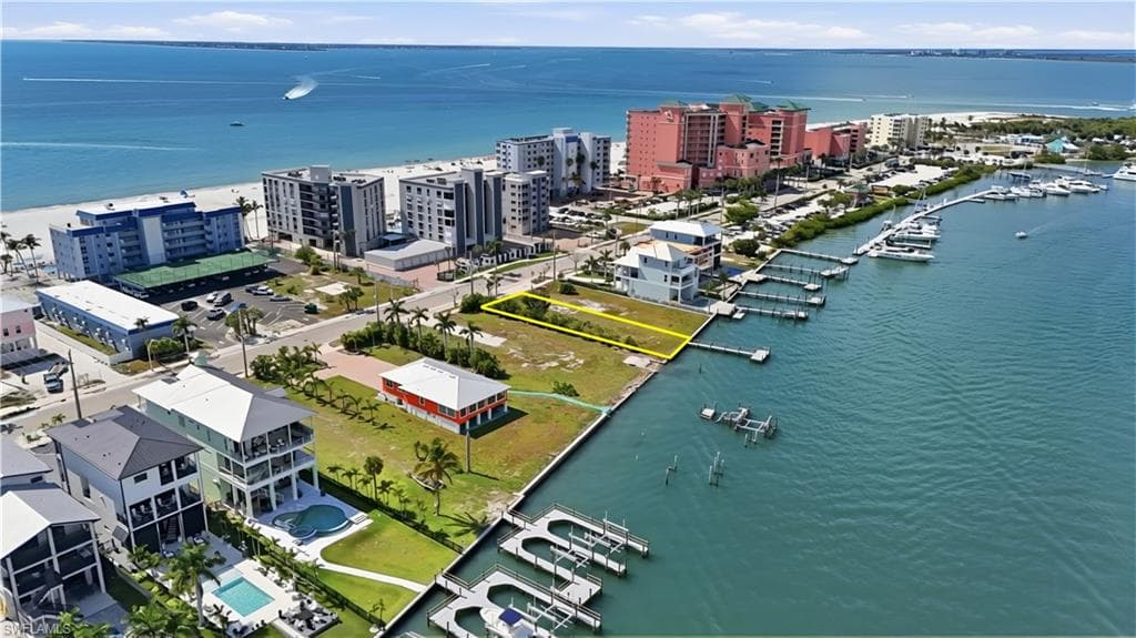 View of urban area with a nearby body of water and numerous boat docks - Virtually Edited Image