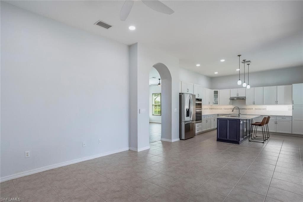 Family Room w/ Tile Flooring