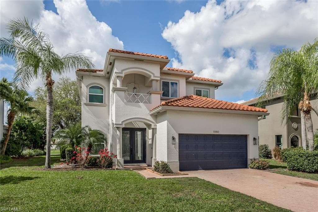 Tile Roof, Impact Windows and Front Door, Paver Driveway
